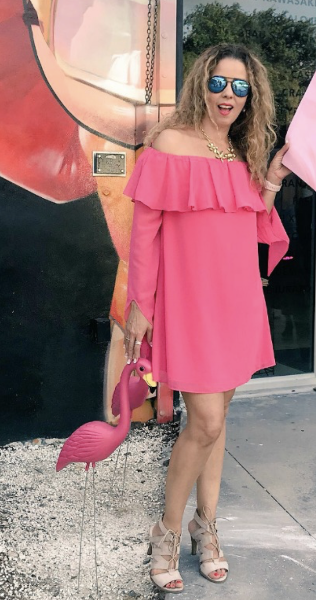 Trendy Latina in a pink dress
