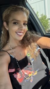 Latina Driving Subaru