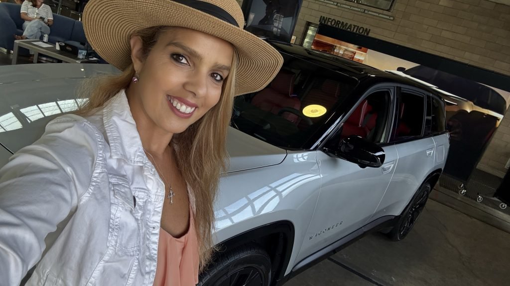 Latina driving the Wagoneer S