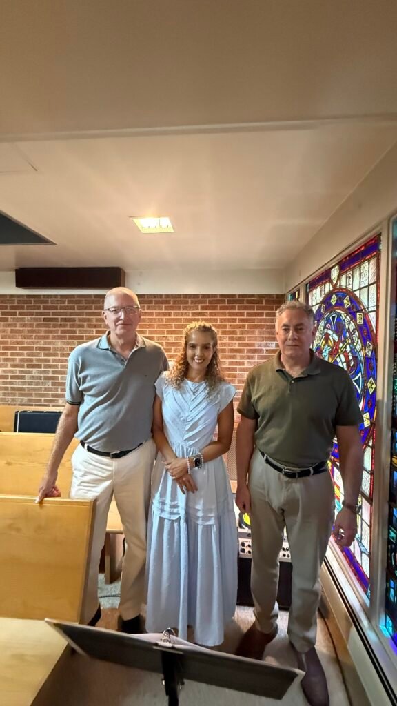 ready to play and sing at a local church